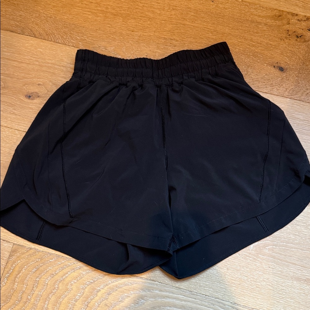 3 pair Lulu Track That High-Rise Lined Short 5" in Black, Olive, and Lavender. - Picture 6 of 7